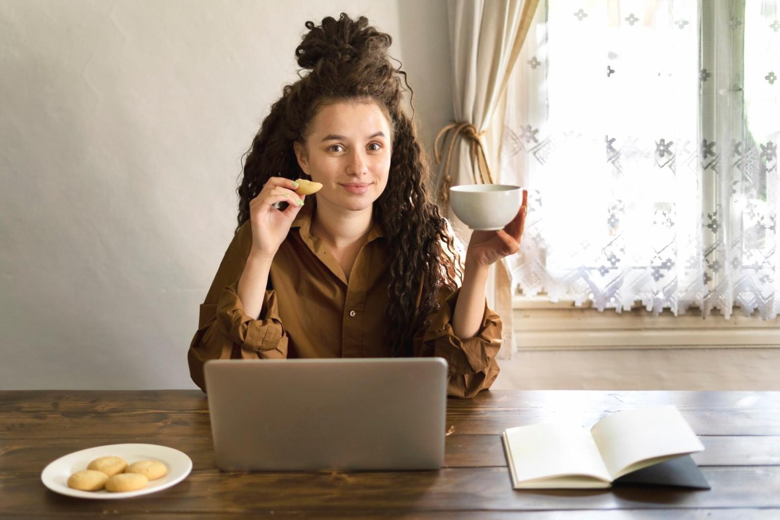 Students working together on budgeting exercises in a bright, modern classroom setting