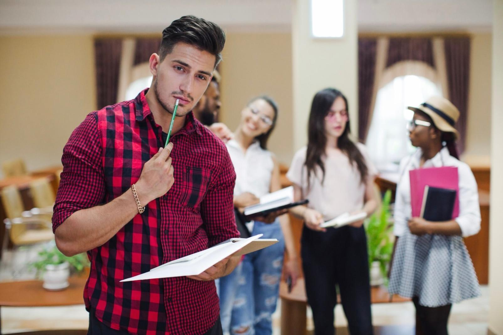 Group photo of program participants celebrating their completion certificates